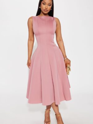 Dress in 95% polyester and 5% spandex