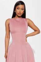 Dress in 95% polyester and 5% spandex