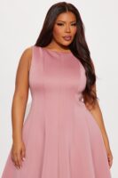 Dress in 95% polyester and 5% spandex