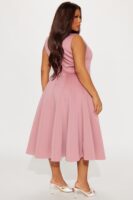 Dress in 95% polyester and 5% spandex