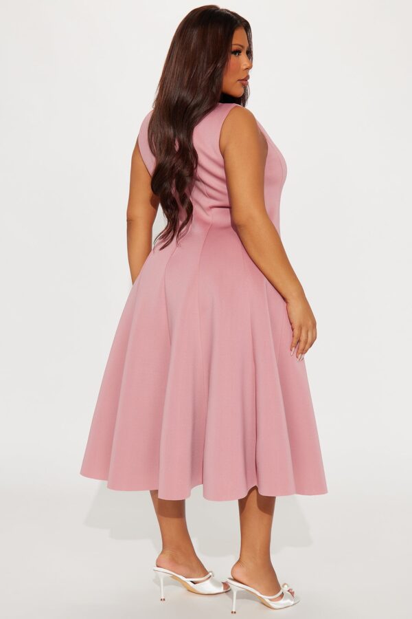 Dress in 95% polyester and 5% spandex