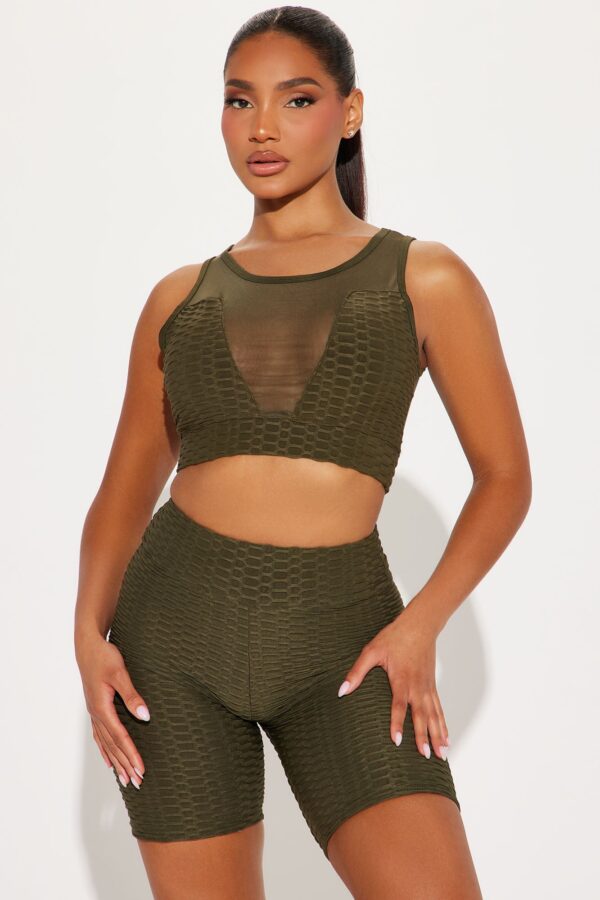 Piece in Olive 87% polyester