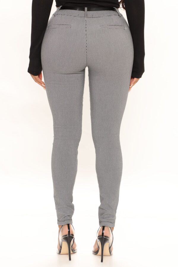 Pants in Black 74% rayon, 12% polyester, 11% nylon, and 3% spandex