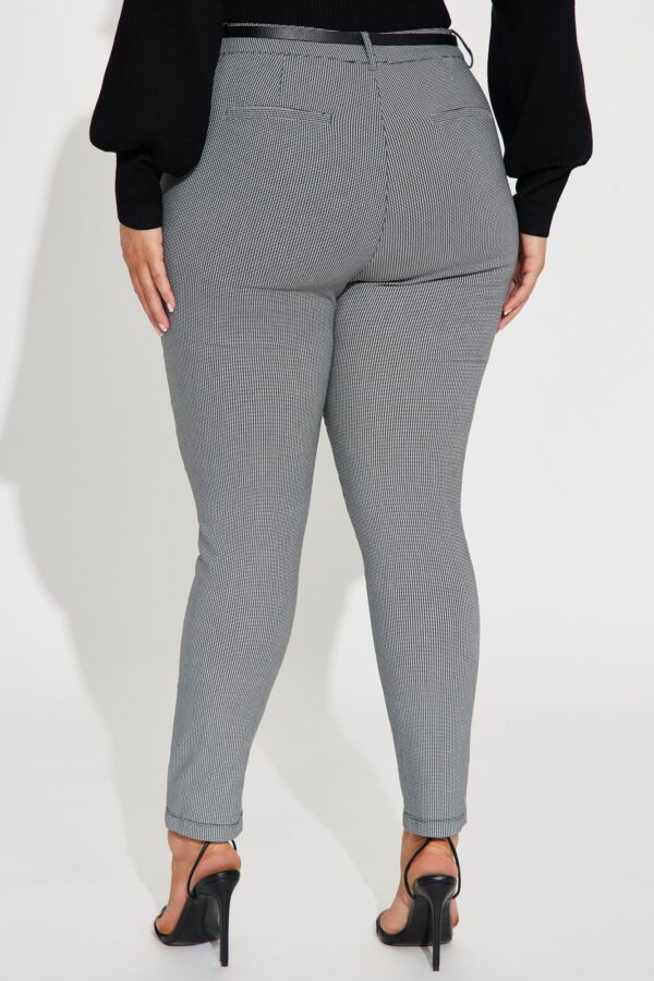 Pants in Black 74% rayon, 12% polyester, 11% nylon, and 3% spandex